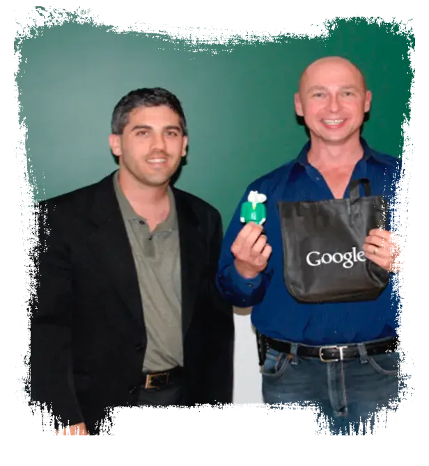 Forrest Dombrow and Tim Ash speaking at a Google sponsored event